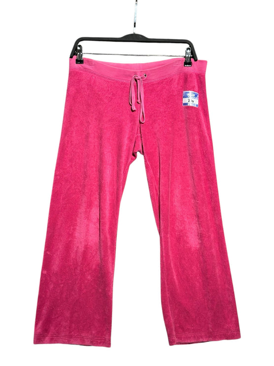 OutOf10 Juicy Couture hot pink velour lounge pants with an elasticated drawstring waistband on a hanger.