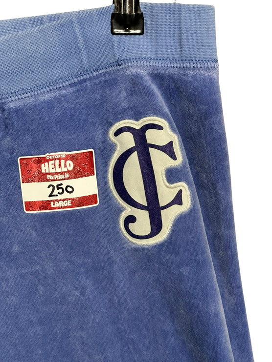 OutOf10 Juicy Couture periwinkle blue velour lounge jogger pants featuring an embroidered JC logo patch on the hip