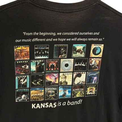 OutOf10 black cotton Kansas band 40th anniversary t-shirt featuring a collage of classic album covers on the back.