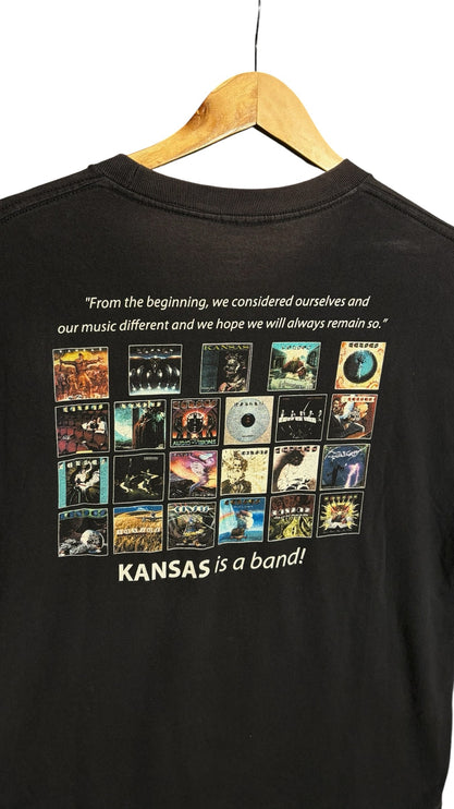 OutOf10 black cotton Kansas band 40th anniversary t-shirt featuring a collage of classic album covers on the back.