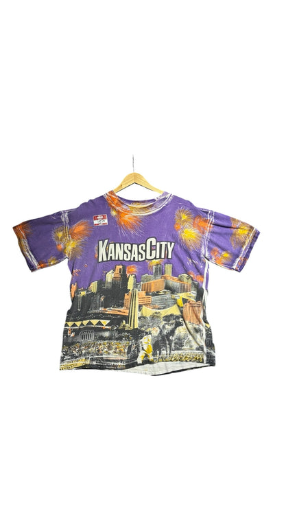 OutOf10 vintage purple crewneck t-shirt featuring a vibrant Kansas City skyline graphic print with firework accents.