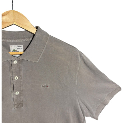 OutOf10 Lacoste vintage washed taupe cotton pique polo shirt with embroidered crocodile logo on a wooden hanger