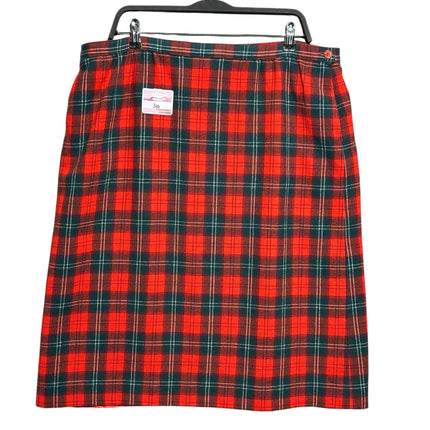 OutOf10 red and green Lennox tartan wool blend midi skirt with button detail, hanging on a black hanger.