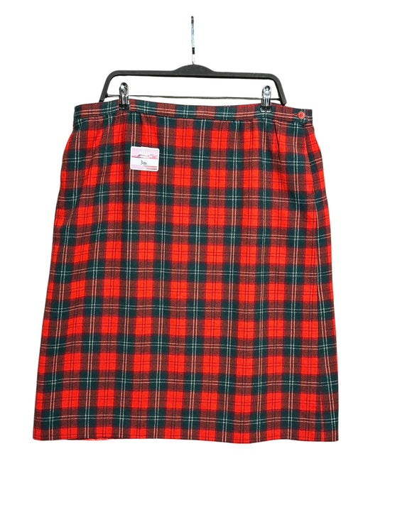 OutOf10 red and green Lennox tartan wool blend midi skirt with button detail, hanging on a black hanger.