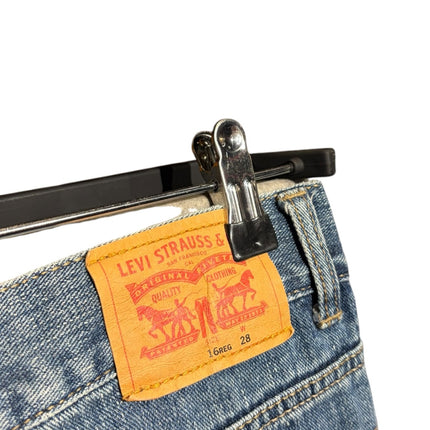 OutOf10 Levi Strauss & Co mid-wash blue denim shorts featuring the iconic leather brand patch on the back waistband.