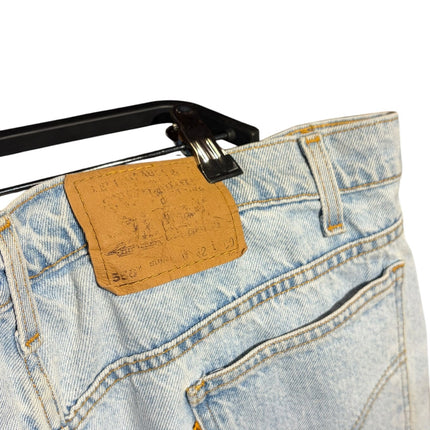 OutOf10 Levi's light wash denim shorts featuring a classic leather back patch and five-pocket design on a hanger