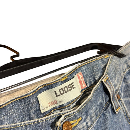 OutOf10 Levi's 569 loose fit light wash denim shorts with a button fly and branded waistband patch on a hanger.