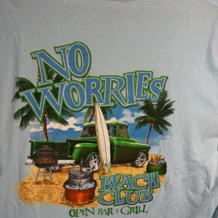 OutOf10 light blue graphic t-shirt featuring a No Worries Beach Club print with a green truck, surfboards, and palms