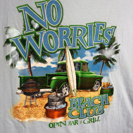 OutOf10 light blue cotton t-shirt featuring a vintage truck, surfboard, and beach grill graphic on the back.