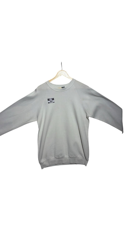 OutOf10 light grey crewneck sweatshirt with a small front logo detail, crafted from a soft cotton blend.