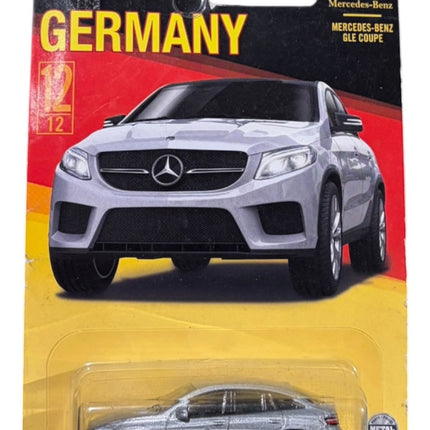 OutOf10 Matchbox Mercedes-Benz GLE Coupe diecast toy car in metallic silver, packaged in a Germany series blister card.