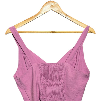 OutOf10 mauve pink sleeveless cropped tank top with V-neckline and smocked elastic back detail on a wooden hanger