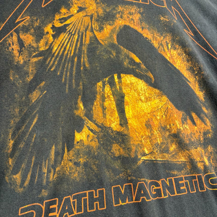 OutOf10 Metallica Death Magnetic cotton t-shirt featuring a black raven graphic on a distressed orange background.