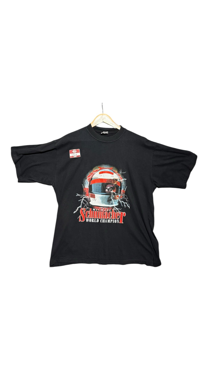 OutOf10 black cotton t-shirt featuring a Michael Schumacher World Champion graphic print with a racing helmet design.