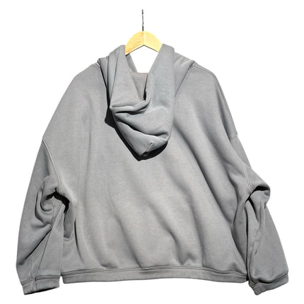OutOf10 Missguided grey oversized zip-up hoodie hanging on a wooden hanger, back view