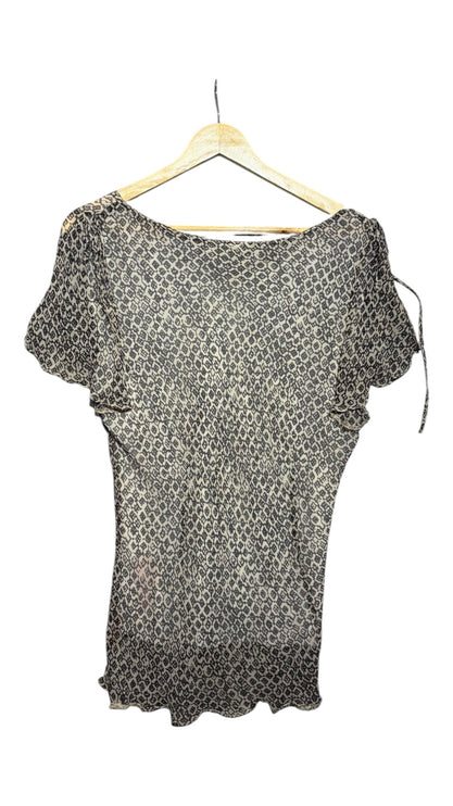 OutOf10 monochrome geometric print V-neck blouse with flutter sleeves on a wooden hanger