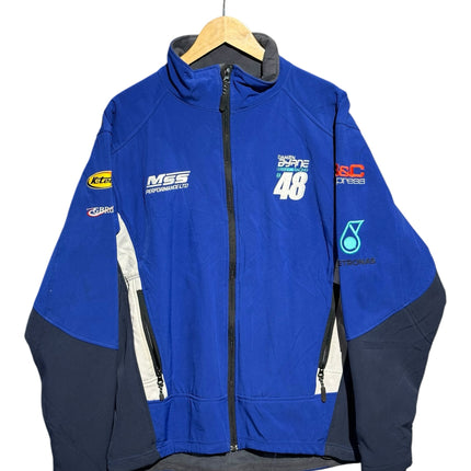 OutOf10 royal blue and navy softshell racing jacket with MSS Performance and Damien Byrne Racing sponsor embroidery.