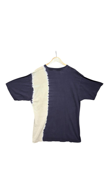 Back view of OutOf10 vintage-inspired navy and bleached white cotton t-shirt with an asymmetrical two-tone design.