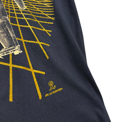 OutOf10 navy blue cotton t-shirt featuring a gold F/A-18 fighter jet graphic and Blackbird logo on the front