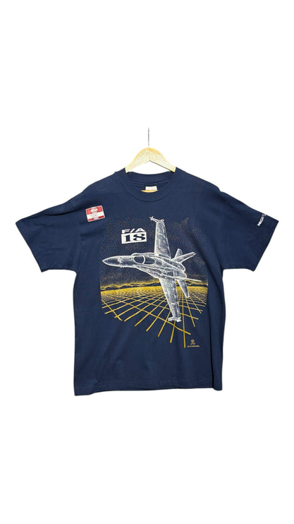 OutOf10 navy blue cotton t-shirt featuring a white F/A-18 fighter jet graphic over a golden grid landscape