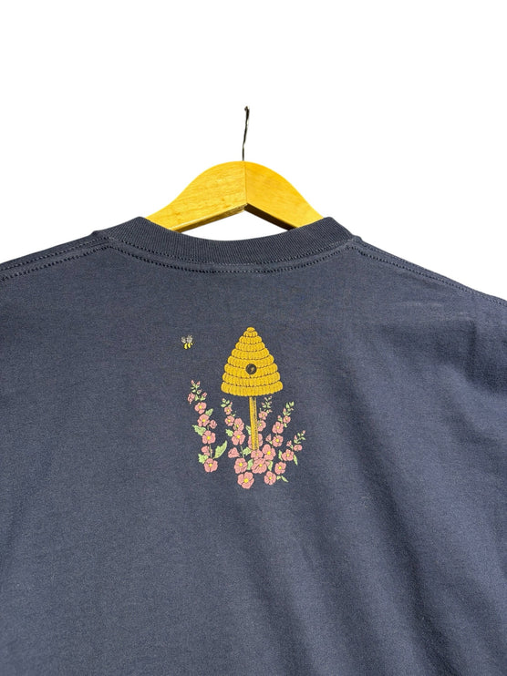 OutOf10 navy blue cotton t-shirt featuring a small beehive and floral graphic on the back
