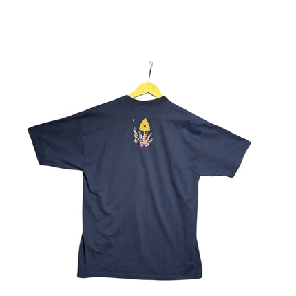 OutOf10 navy blue cotton t-shirt featuring a small beehive and floral graphic on the back, short sleeve crewneck style.