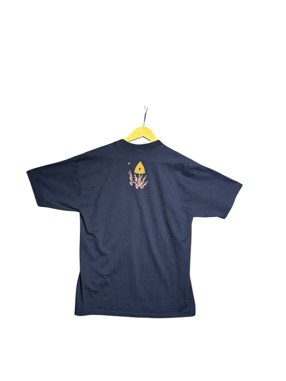 OutOf10 navy blue cotton t-shirt featuring a small beehive and floral graphic on the back, short sleeve crewneck style.