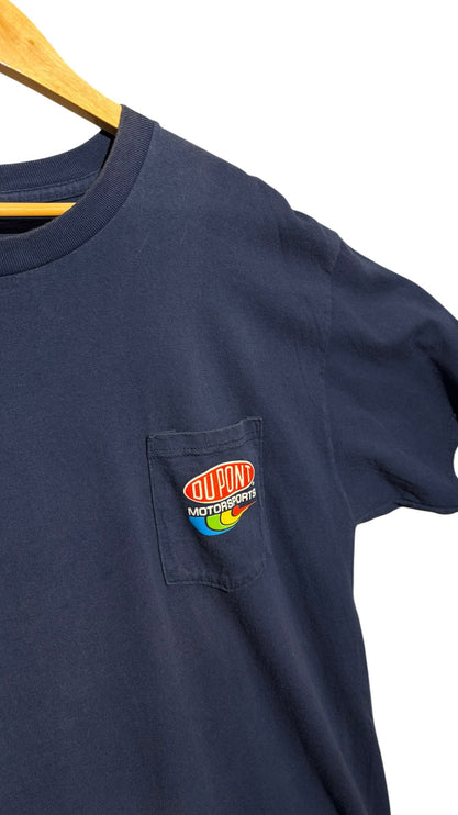 OutOf10 navy blue cotton t-shirt with a DuPont Motorsports logo on the chest pocket, hanging on a wooden hanger.