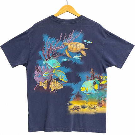 OutOf10 navy blue cotton t-shirt featuring a vibrant underwater scene with a sea turtle, tropical fish, and coral.