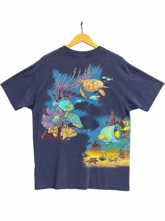 OutOf10 navy blue cotton t-shirt featuring a vibrant underwater scene with a sea turtle, tropical fish, and coral.
