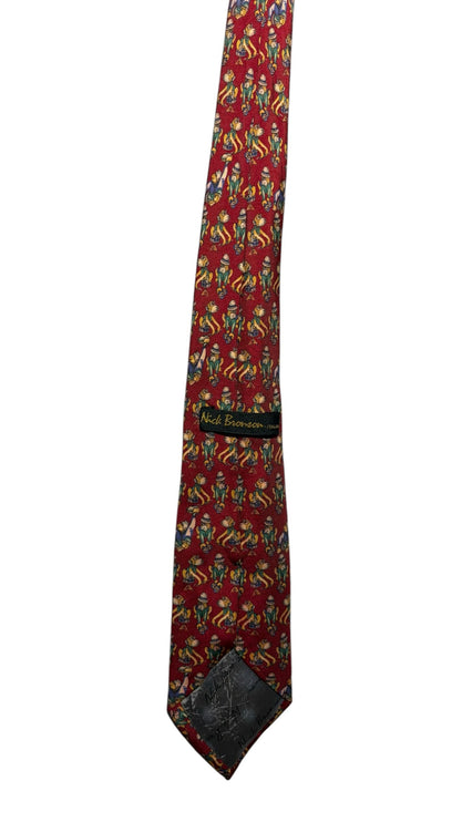 OutOf10 Nick Bronson red silk necktie featuring a whimsical patterned print of small figures, made in Italy.