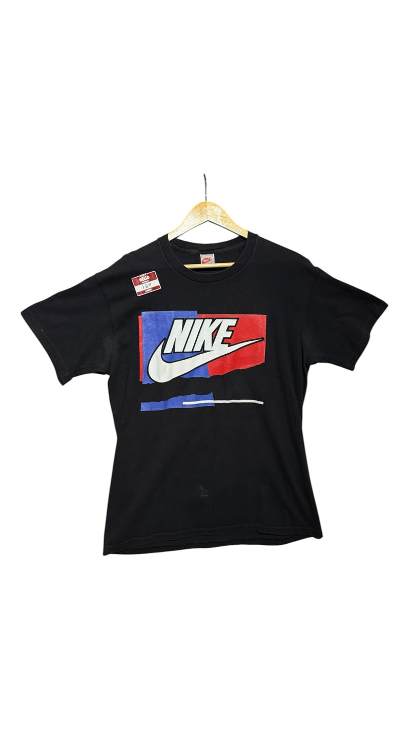 OutOf10 black Nike crewneck t-shirt with a red and blue graphic print on a wooden hanger