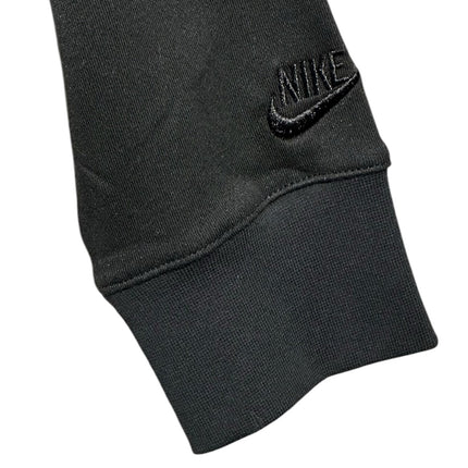 OutOf10 Nike black athletic hoodie sleeve featuring ribbed cuffs and subtle embroidered Nike logo detail