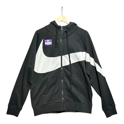 OutOf10 Nike black and white full-zip hoodie with an oversized Swoosh graphic, drawstring hood, and ribbed cuffs.