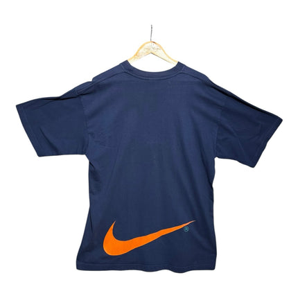 OutOf10 Nike navy blue cotton t-shirt with a large orange Swoosh logo on the back, displayed on a wooden hanger.