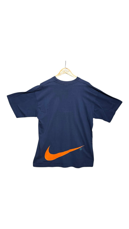 OutOf10 Nike navy blue cotton t-shirt with a large orange Swoosh logo on the back, displayed on a wooden hanger.