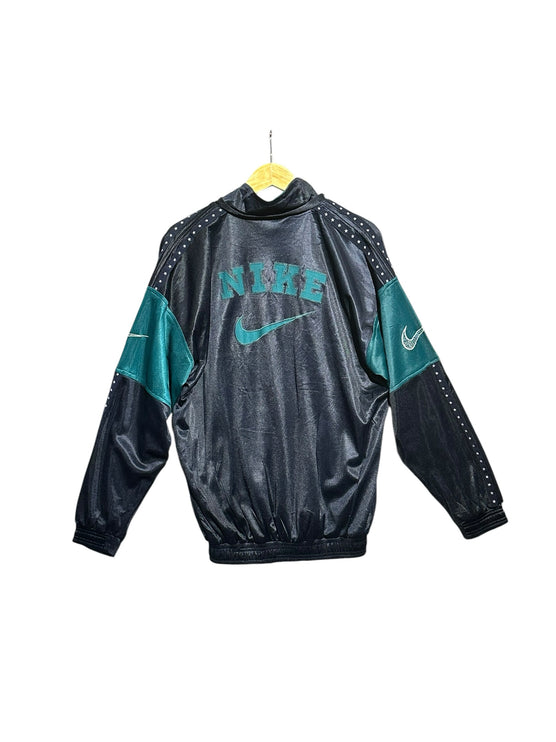 OutOf10 vintage Nike black and teal track jacket with back embroidery, star sleeve detailing, and full zip closure.