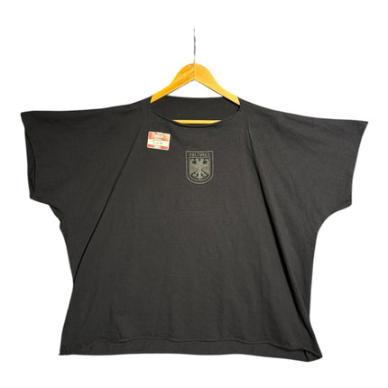 OutOf10 oversized black cotton t-shirt featuring a distressed eagle crest graphic and raw-edge neckline.