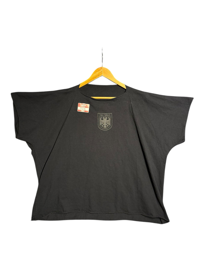 OutOf10 oversized black cotton t-shirt featuring a distressed eagle crest graphic and raw-edge neckline.