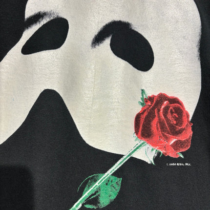 OutOf10 black cotton t-shirt featuring a Phantom of the Opera mask silhouette and a vibrant red rose graphic print.