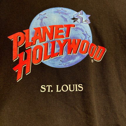 OutOf10 black cotton crewneck t-shirt featuring a vintage Planet Hollywood St. Louis globe logo in blue and red.