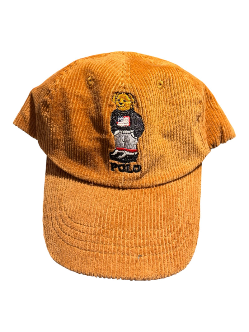 OutOf10 Polo Ralph Lauren ochre corduroy baseball cap featuring an embroidered bear motif on the front panel.