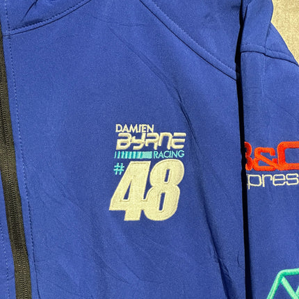 OutOf10 royal blue Damien Byrne Racing softshell jacket with #48 embroidery and sponsor logos