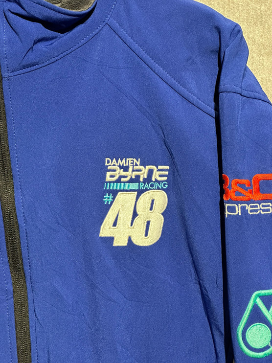 OutOf10 royal blue Damien Byrne Racing softshell jacket with #48 embroidery and sponsor logos