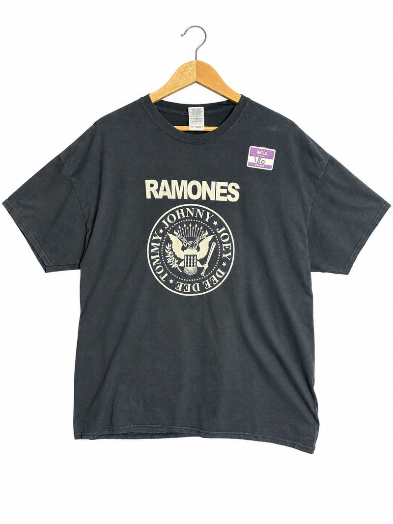 OutOf10 faded black cotton Ramones graphic t-shirt with iconic band seal logo on a wooden hanger