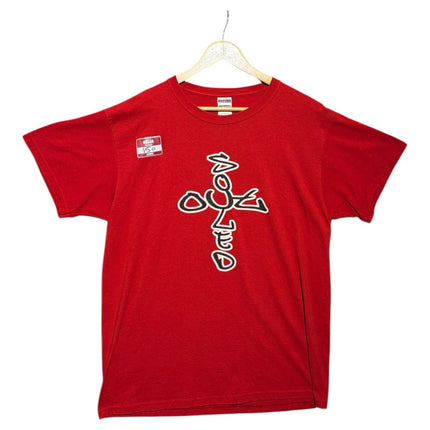 OutOf10 red cotton crewneck t-shirt featuring a stylized white and black cross graphic print on the front.