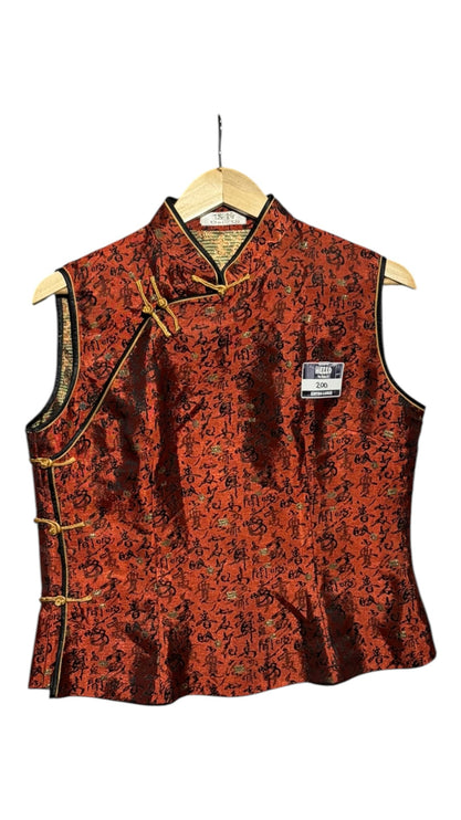 OutOf10 sleeveless red blouse with mandarin collar, calligraphy pattern, and gold frog button closures.