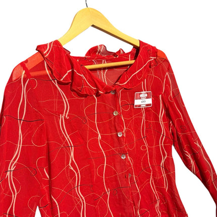OutOf10 red sheer long sleeve blouse with abstract line print, ruffled collar, and button-down front on a hanger