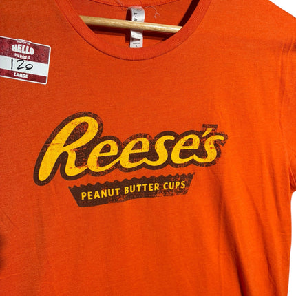 OutOf10 orange crewneck t-shirt featuring a vintage-style distressed Reese's Peanut Butter Cups graphic logo.