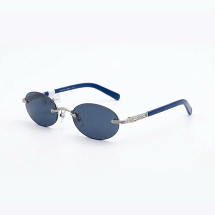 OutOf10 rimless oval sunglasses featuring deep blue lenses, silver-tone engraved metal temples, and blue temple tips.